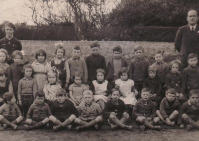 BRYNFORD SCHOOL 1940 - Infants and Classes 1 & 2 TEACHER : Miss Arfona Jones HEADMASTER : Mr Thomas BACK ROW : Eilwen Davies, Vera Parry, Eirlys Banford, Eva Roberts, Glyn Hughes, Glyn Ellis Jones, Teddy Williams, Glyn Williams, ? SECOND ROW : ?, Sheila Davies, Frances Davies, Shirley Collins, Sheila Pamela Davies, Edie Williams, Rosie Davies, Norah Davies, Gordon Marshall FRONT ROW : David Roberts, Edgar Roberts, Trevor Owen, Albert Jones, Gordon Davies, Derek Williams, Iorwerth Spencer, Cyril Griffiths